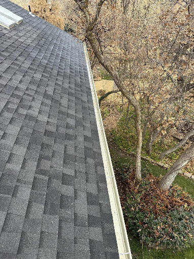 Clean residential gutter after leaves and debris have been removed